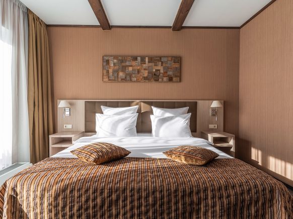 Фотография номера гостиницы Arkhyz Royal Resort & SPA