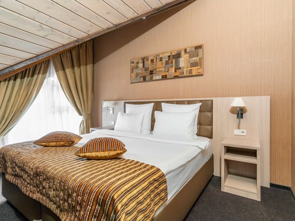 Фотография номера гостиницы Arkhyz Royal Resort & SPA