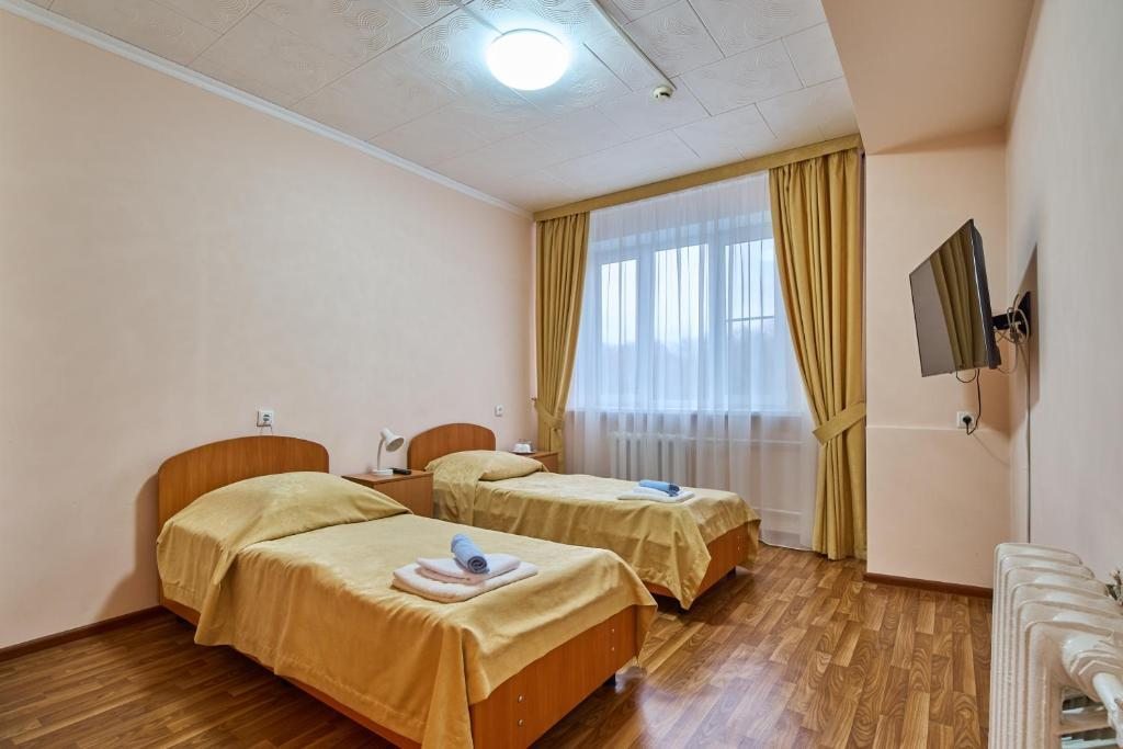 Двухместный (Улучшенный двухместный номер с 2 отдельными кроватями) отеля Менделеево, Зеленоград