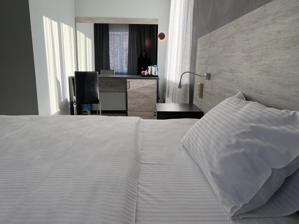 Двухместный (Улучшенный двухместный номер с 1 кроватью или 2 отдельными кроватями) отеля Авиатор, Орел