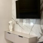 Телевизор в главной спальне