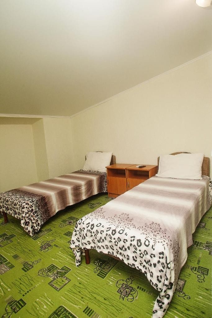 Двухместный (Двухместный номер с 2 отдельными кроватями и общей ванной комнатой) гостевого дома Holiday Park на Мира, Кабардинка