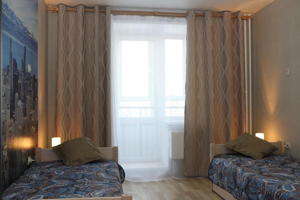 Двухместный (Двухместный номер с 2 отдельными кроватями и собственной ванной комнатой) мини-гостиницы Атмосфера, Томск