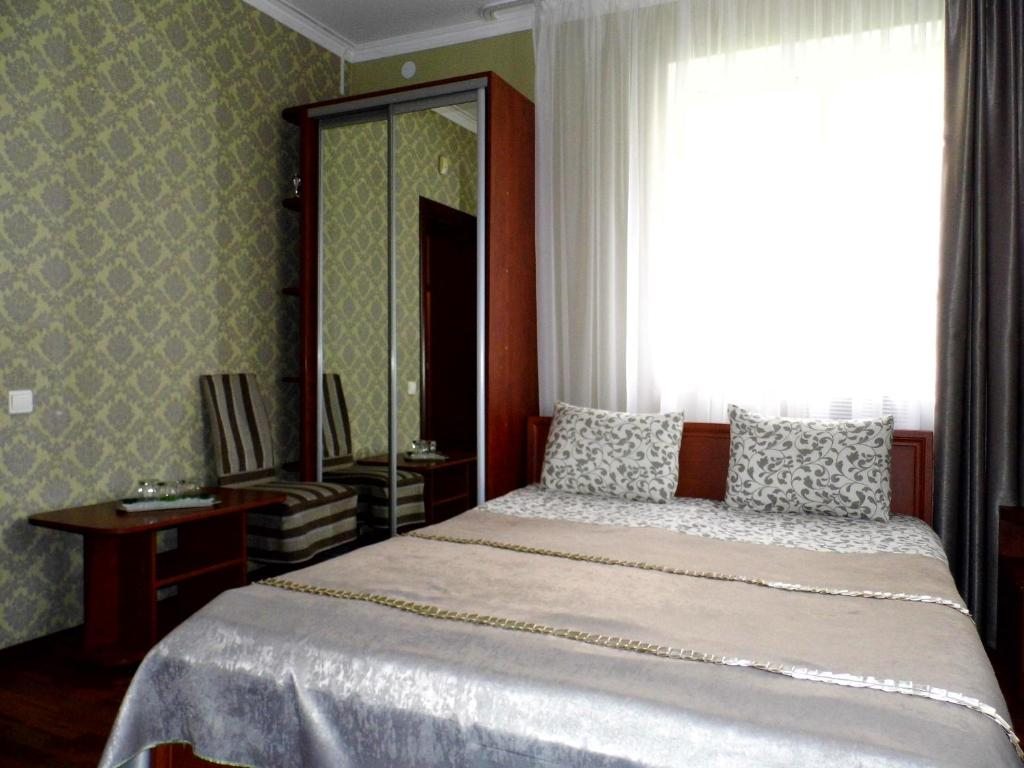 Семейный (Семейный номер с ванной комнатой) мини-отеля Тихая Гавань, Калининград