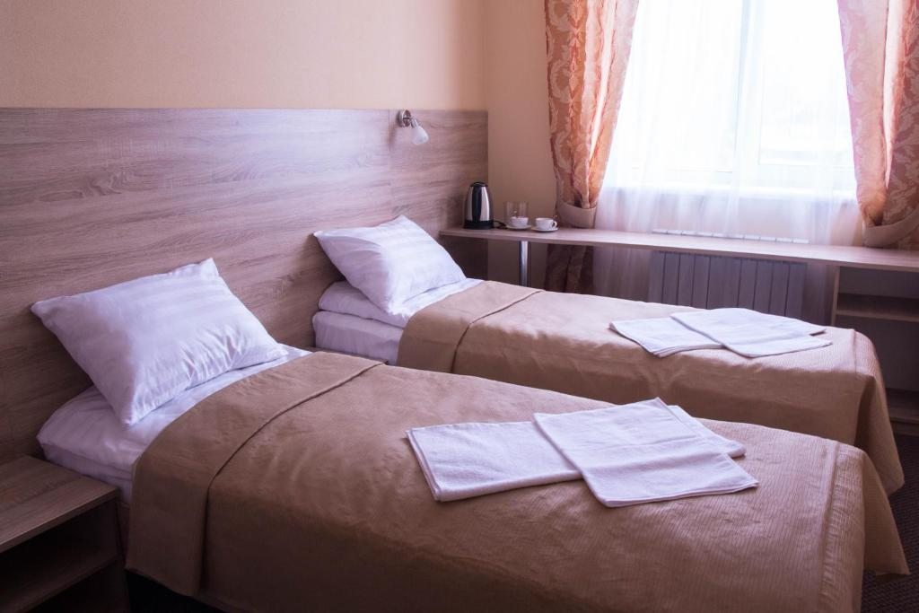 Двухместный (Двухместный номер с 2 отдельными кроватями) отеля Альтаир, Казань