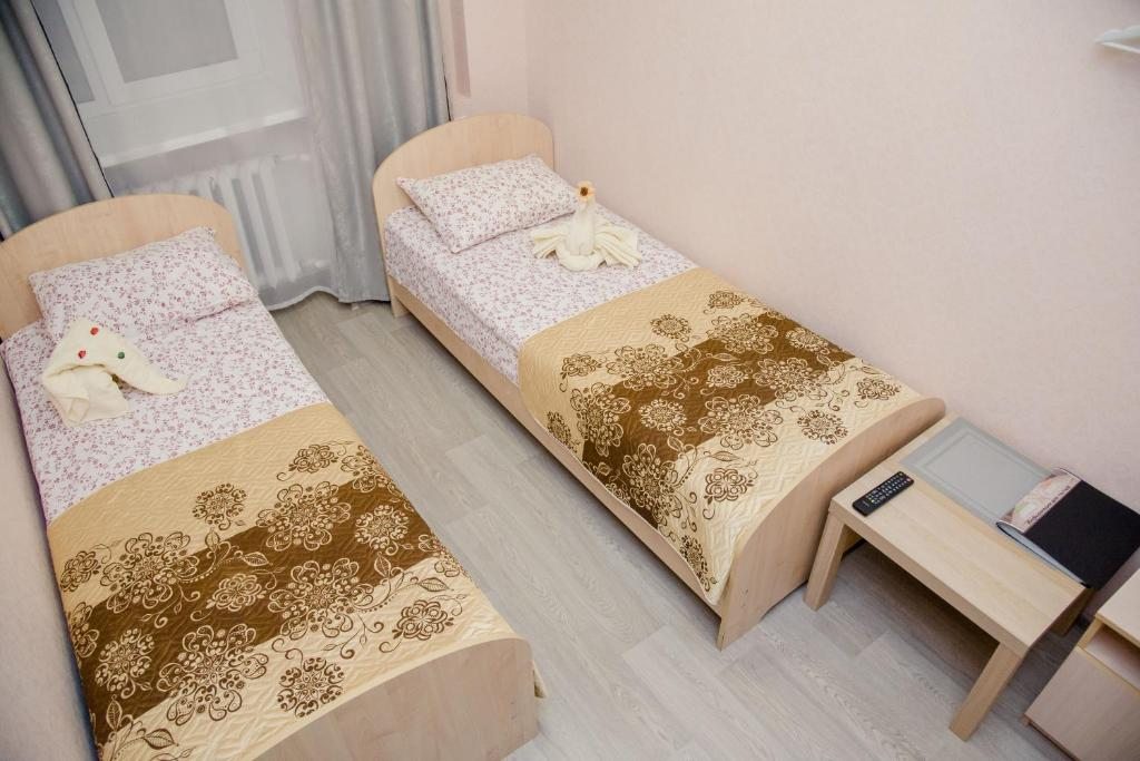 Двухместный (Бюджетный двухместный номер с 2 отдельными кроватями) мини-отеля ZOO, Казань