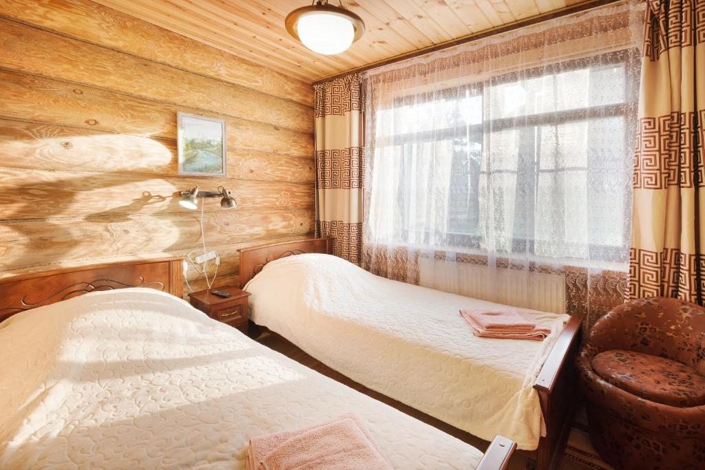 Двухместный (Двухместный номер с 2 отдельными кроватями) гостевого дома На Кремлевском берегу, Суздаль