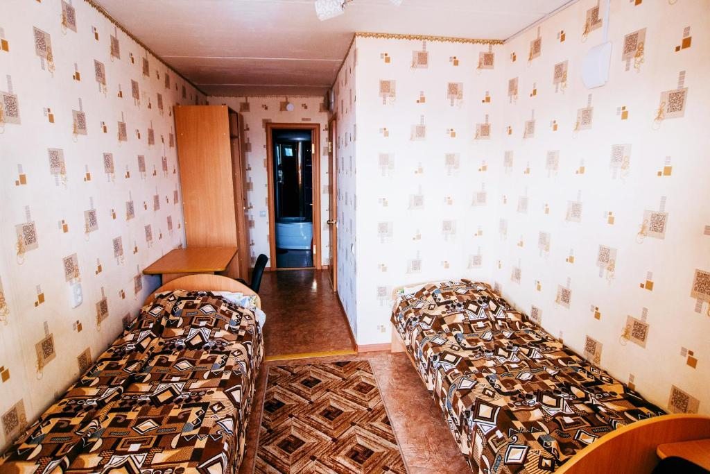 Двухместный (Улучшенный двухместный номер с 2 отдельными кроватями) отеля Уральский РЭК, Белорецк
