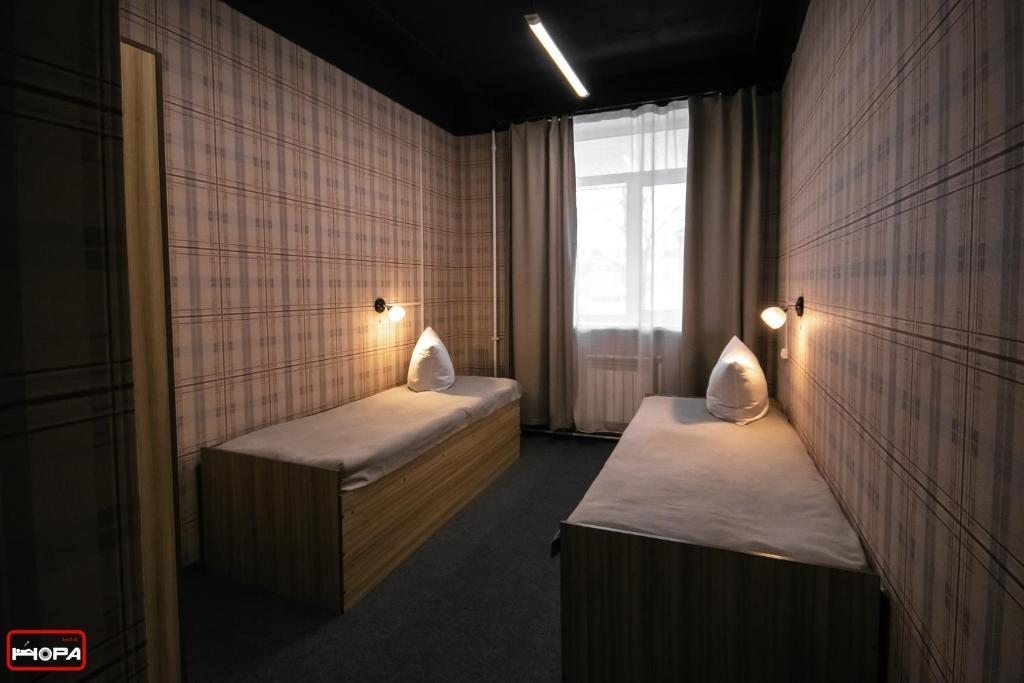 Номер (Односпальная кровать в общем номере) хостела НОРА, Южно-Сахалинск