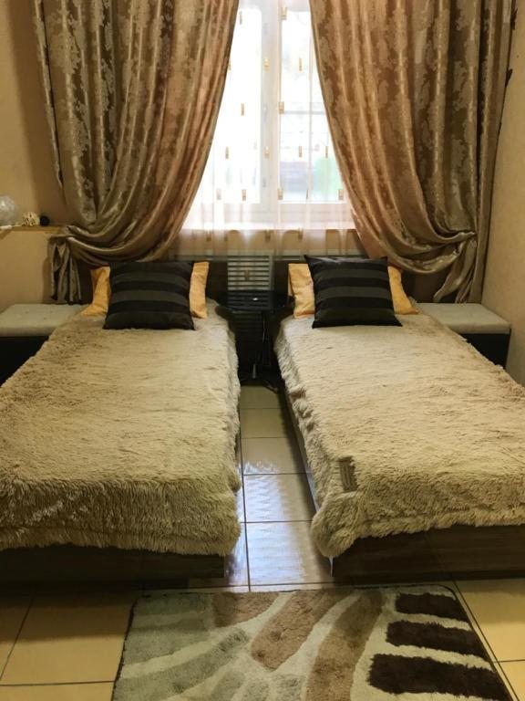 Двухместный (Двухместный номер «Комфорт» с 1 кроватью или 2 отдельными кроватями) мини-отеля Глория, Мурманск