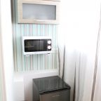 Холодильник. микроволновая печь , шкаф с посудой в номерах "Комфорт"