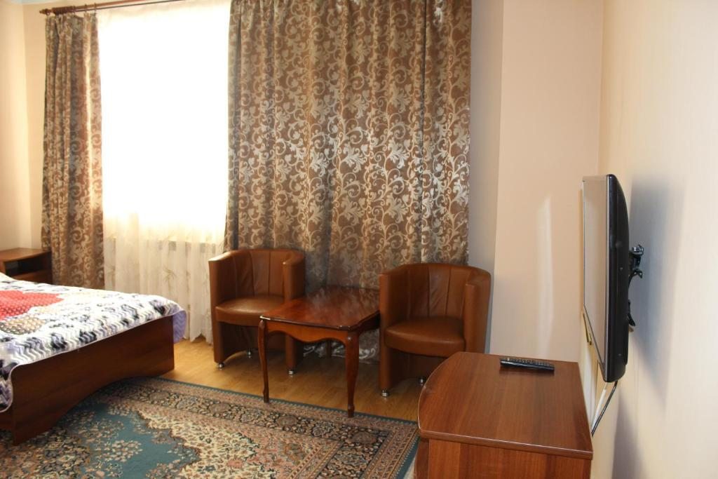 Двухместный (Бюджетный двухместный номер с 2 отдельными кроватями) мини-гостиницы Охотник, Бердск
