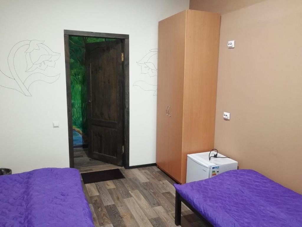 Номер (Односпальная кровать в двухместном номере с 2 отдельными кроватями) хостела Полянка, Северодвинск