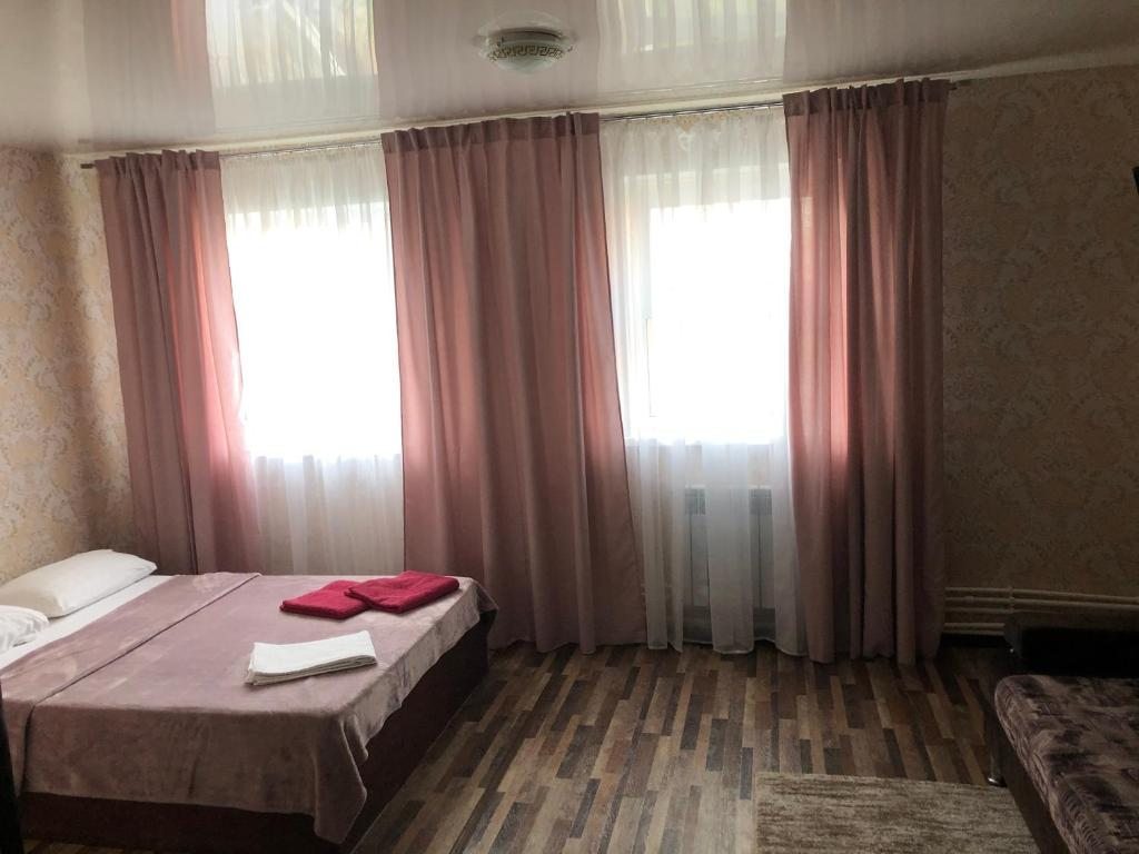 Двухместный (Большой двухместный номер с 2 отдельными кроватями) гостиницы Настоящий отдых, Ижевск