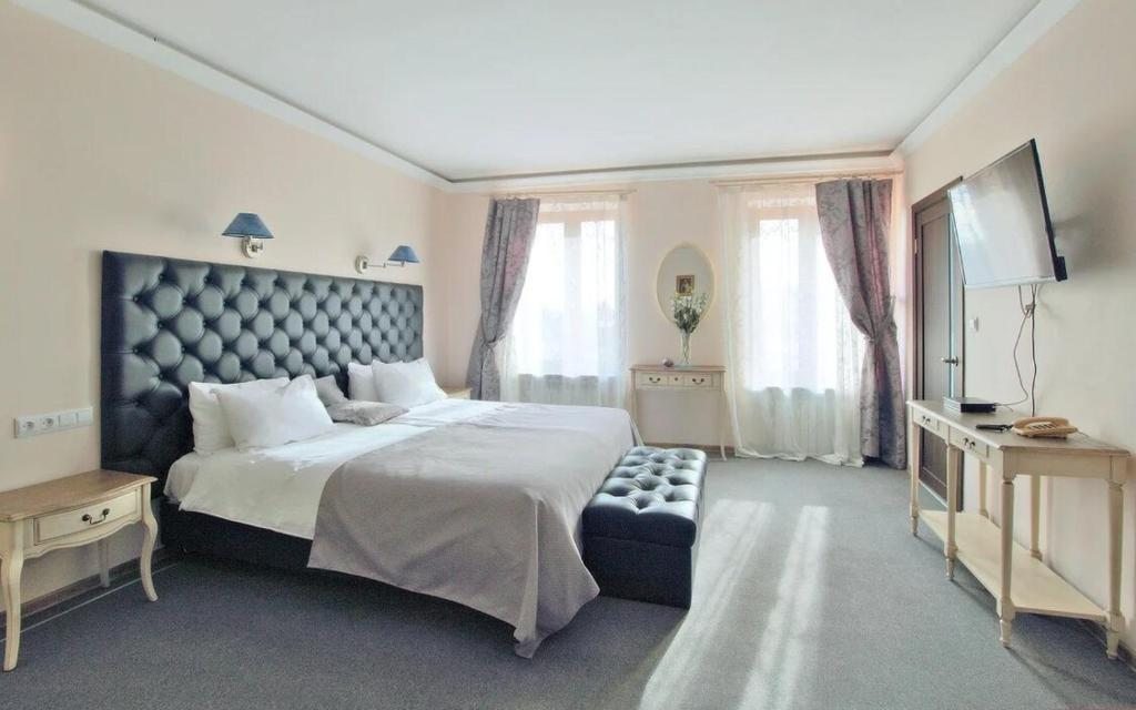 Двухместный (Улучшенный двухместный номер с 1 кроватью или 2 отдельными кроватями) мини-отеля Серый Гусь, Багратионовск
