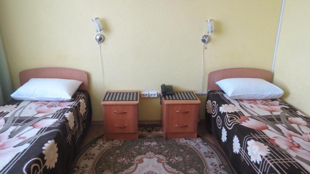 Двухместный (Двухместный номер с 2 отдельными кроватями и собственной ванной комнатой) отеля Арга, Ачинск