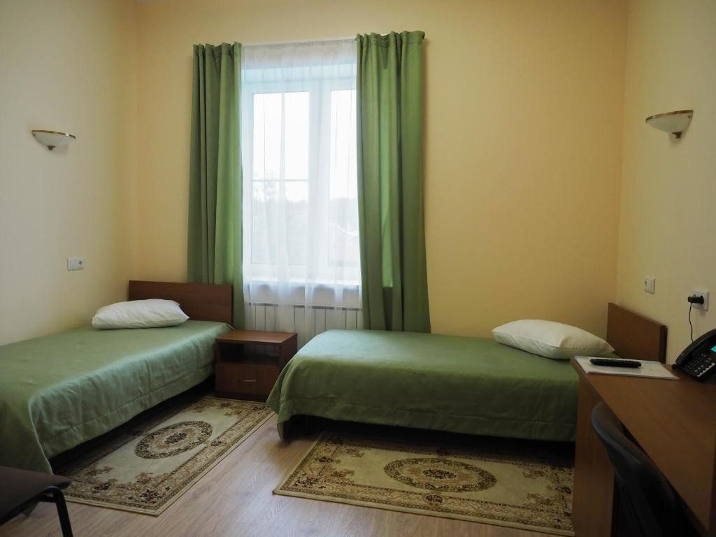 Двухместный (Двухместный номер с 2 отдельными кроватями и душем) гостиницы Спортивная, Верхняя Пышма