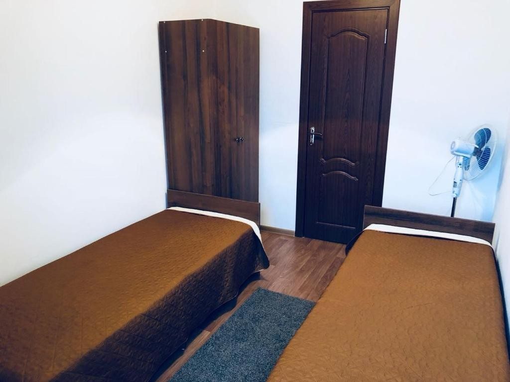 Двухместный (Бюджетный двухместный номер с 2 отдельными кроватями) гостевого дома Амур, Геленджик