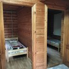 Четырехместный (Номер двухкомнатный с раздельными кроватями в срубе 1 этаж  сруб 1 и сруб 3), Гостевой дом Асият