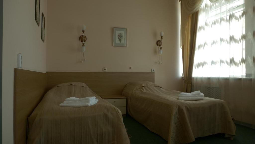 Номер (Кровать в общем номере с 2 кроватями) отеля Транзит, Самара
