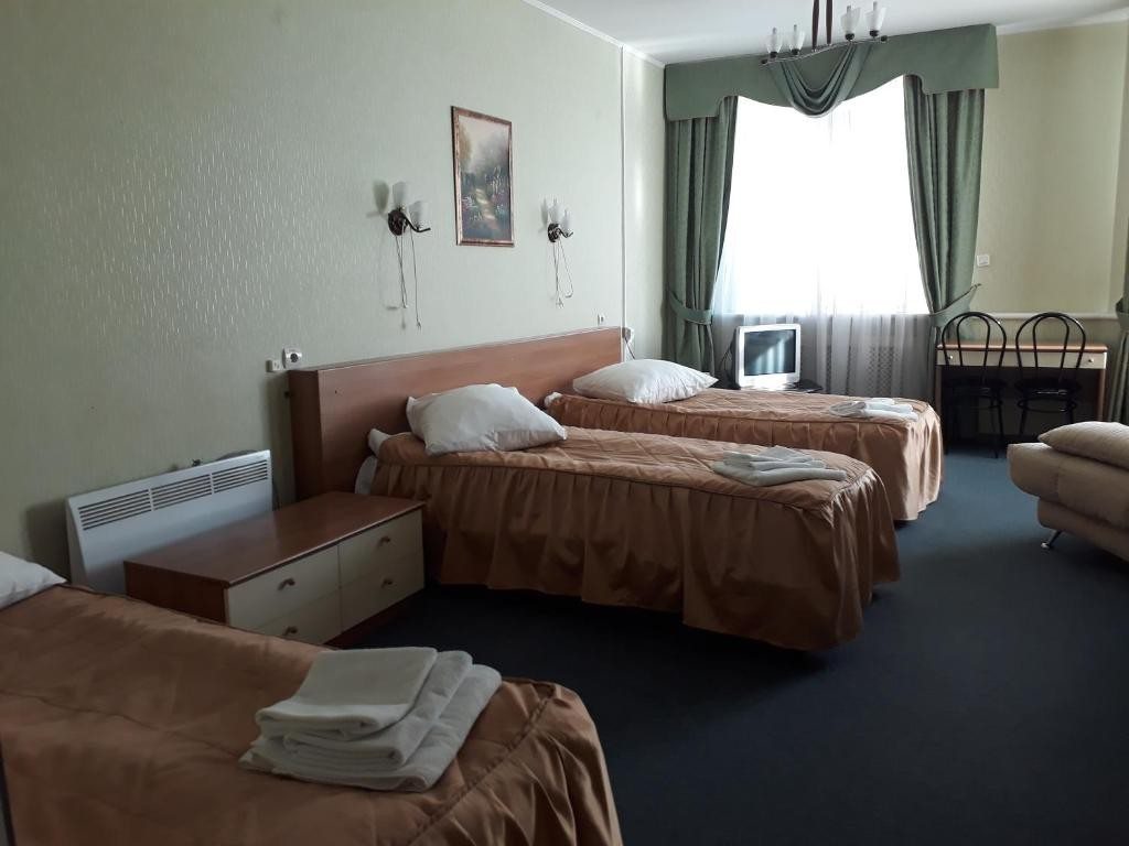 Номер (Односпальная кровать в общем номере для женщин) отеля Транзит, Самара