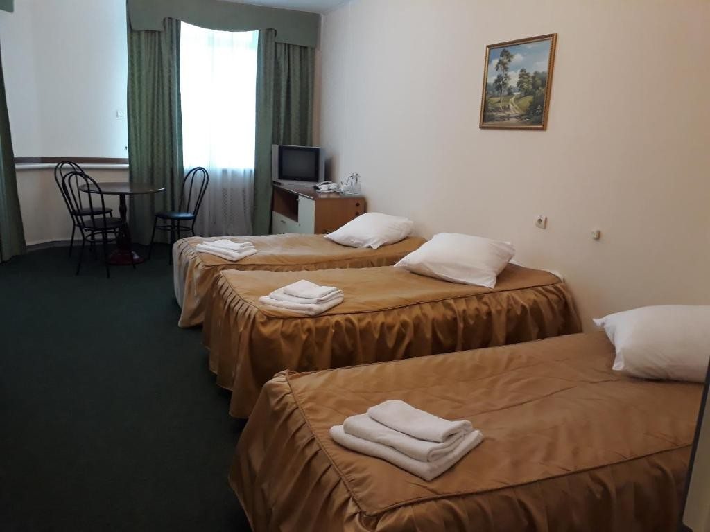 Номер (Односпальная кровать в общем мужском номере) отеля Транзит, Самара