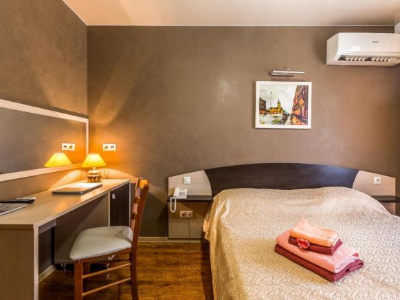 Фотография номера гостиницы Браво Люкс