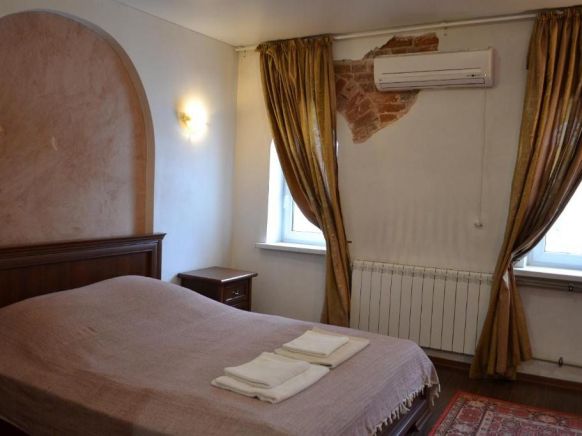 Фотография номера гостиницы Литературная Гостиница Шинель