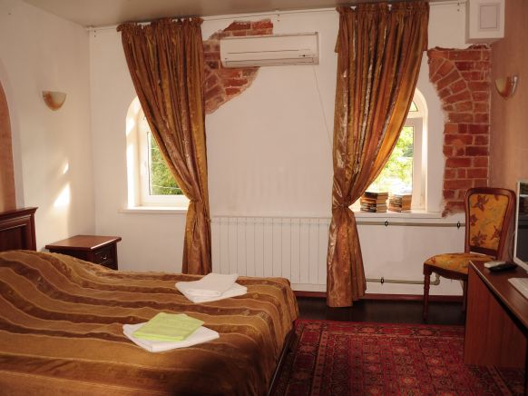 Фотография номера гостиницы Литературная Гостиница Шинель