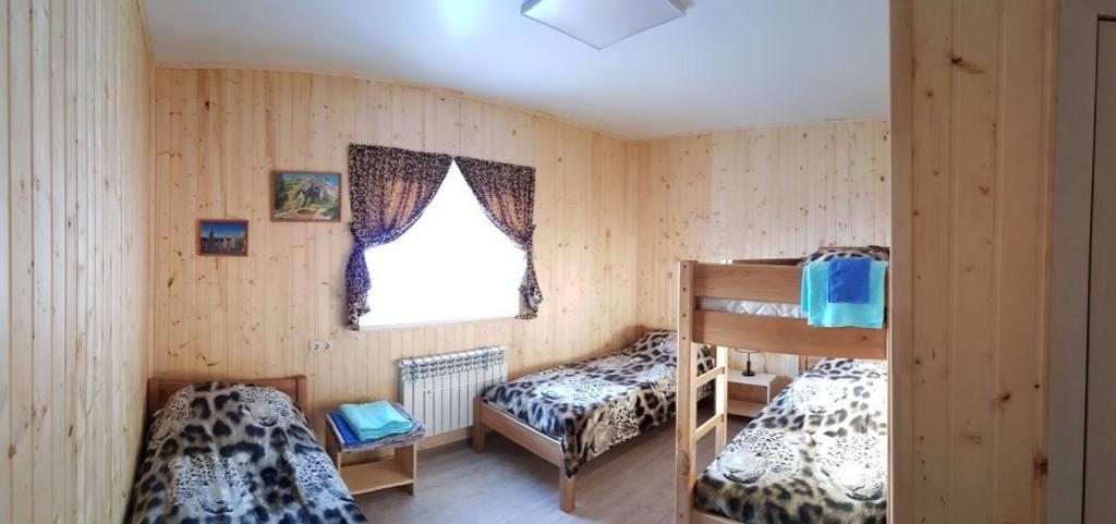 Четырехместный (Четырехместный номер с собственной ванной комнатой) гостевого дома На Мраткино, Белорецк
