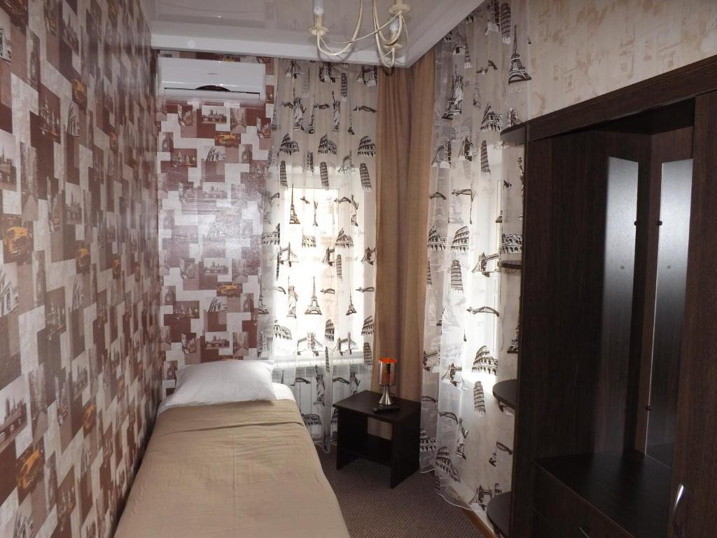 Одноместный (Одноместный номер с общим душем и туалетом) отеля City HoteI, Курган