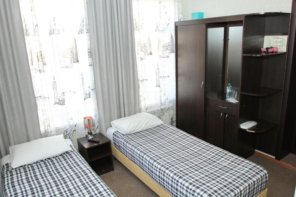 Двухместный (Двухместный номер с 2 отдельными кроватями и ванной комнатой) отеля City HoteI, Курган