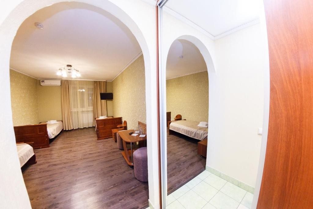 Номер (Односпальная кровать в общем номере) отеля Мини-отель Суворов Курган