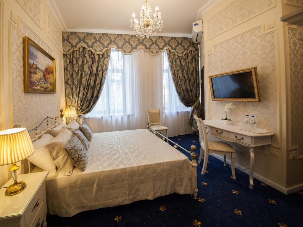 Семейный (Улучшенный семейный номер с 2 спальнями) бутик-отеля Boutique Hotel PORTUM 1905, Сочи