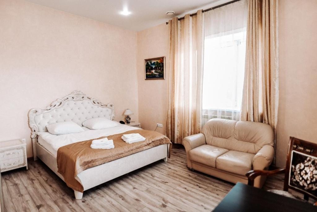 Двухместный (Двухместный номер Делюкс с 1 кроватью и дополнительной кроватью) отеля Торо, Хабаровск