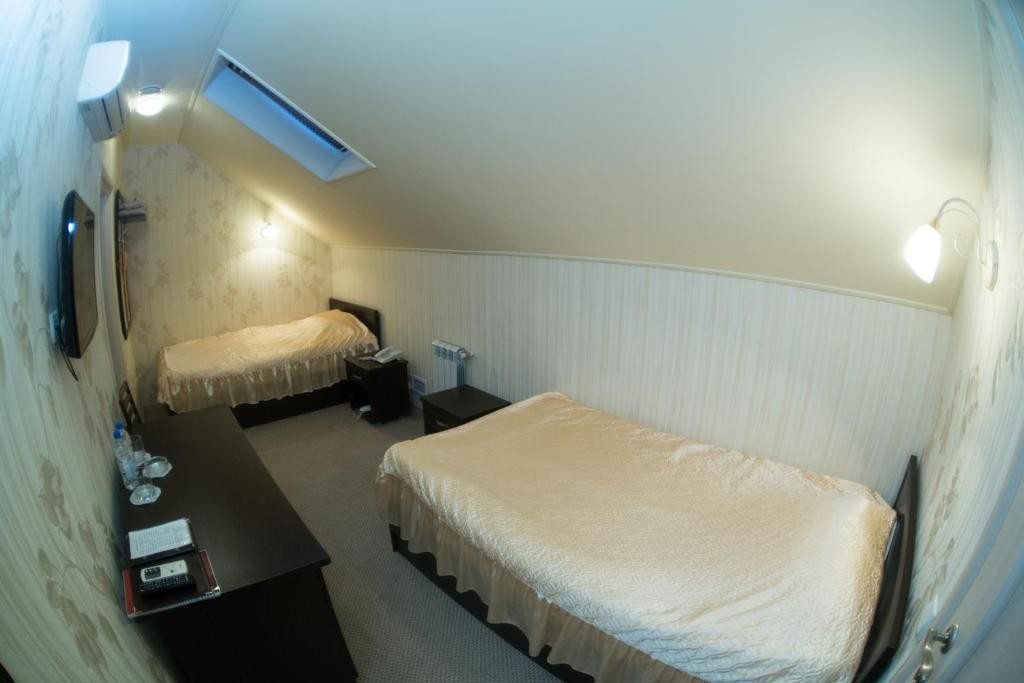 Двухместный (Двухместный номер с 2 отдельными кроватями) отеля Акварель, Оренбург