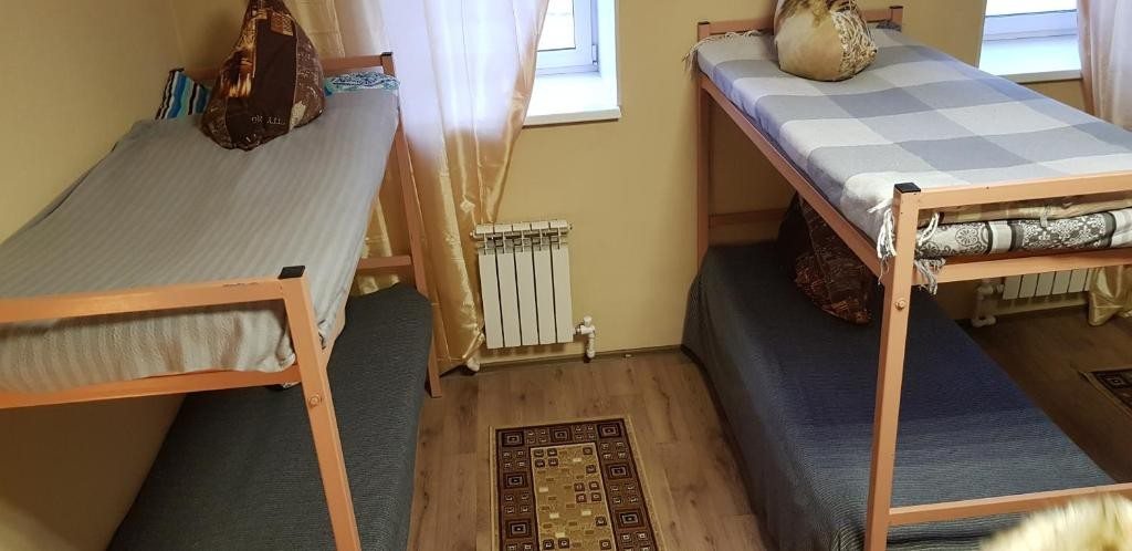 Номер (Спальное место на двухъярусной кровати в общем номере для мужчин) хостела Норд 4104, Омск