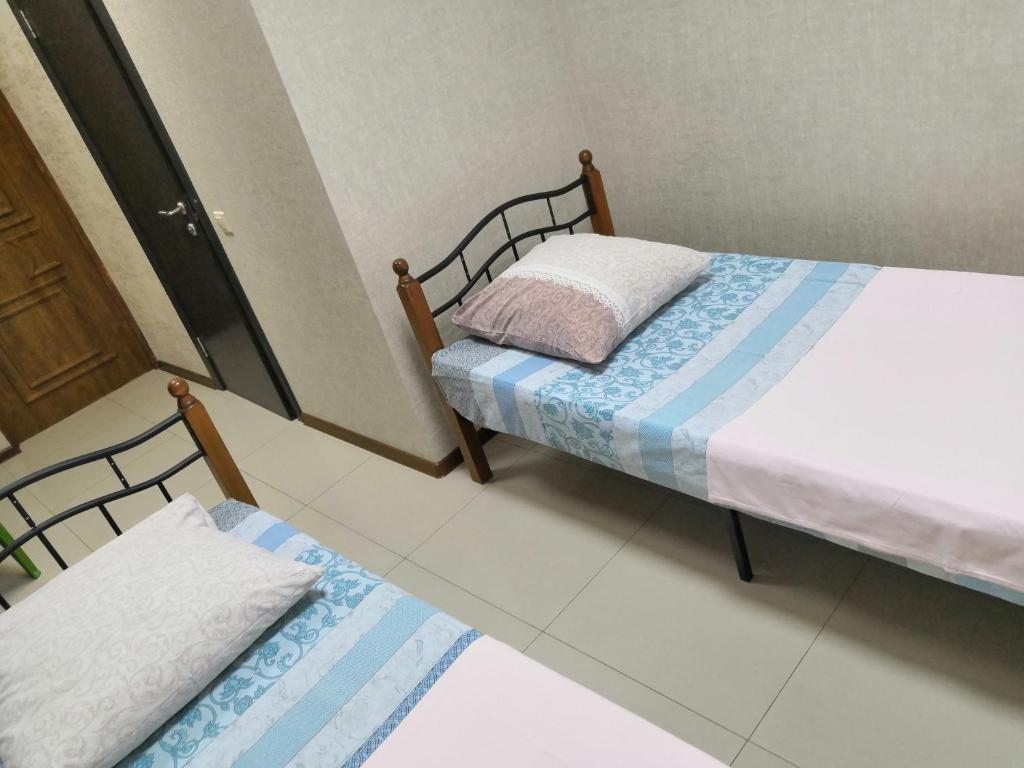 Двухместный (Бюджетный двухместный номер с 2 отдельными кроватями) хостела На Навагинской, Сочи
