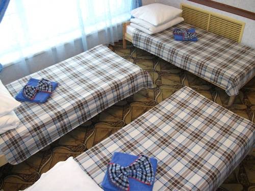 Номер (Односпальная кровать в общем номере с 3 кроватями) гостевого дома Мой отельчик, Санкт-Петербург