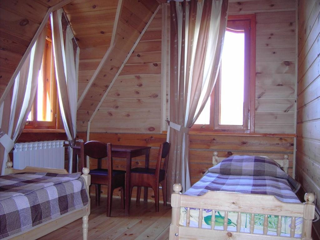 Двухместный (Двухместный номер с 2 отдельными кроватями и видом на озеро) отеля Синильга, Листвянка
