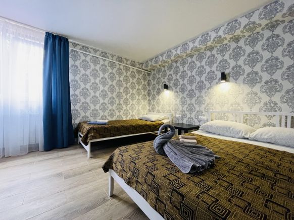 Фотография номера гостевого дома Гости