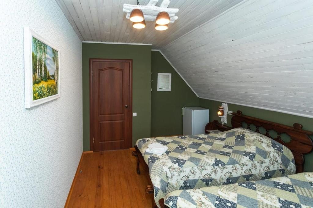 Двухместный (Бюджетный двухместный номер с 2 отдельными кроватями) гостевого дома Петров Дом, Суздаль
