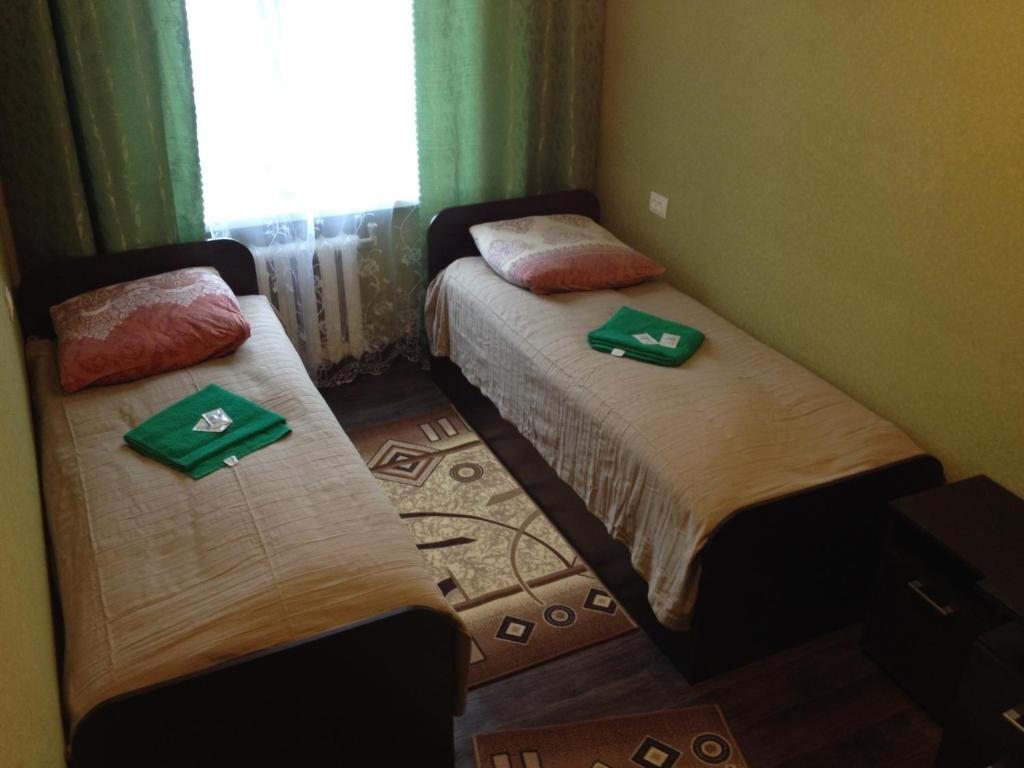 Двухместный (Двухместный номер с 2 отдельными кроватями) отеля Номера на Чубарова 4, Петропавловск-Камчатский