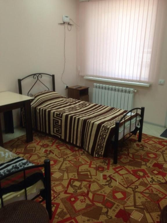 Двухместный (Двухместный номер с 2 отдельными кроватями и душем) отеля На Карла Маркса 170, Тамань