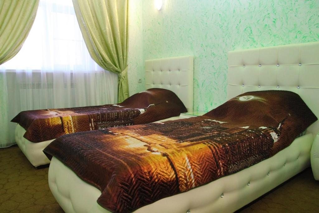 Двухместный (Двухместный номер с 2 отдельными кроватями и ванной) отеля Амазонка на Объездной, Ставрополь