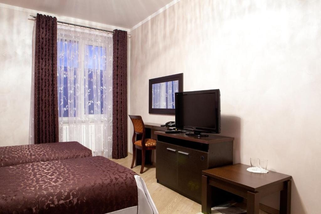 Двухместный (Улучшенный двухместный номер с 2 отдельными кроватями) гостиницы Пальмира Клаб, Ставрополь