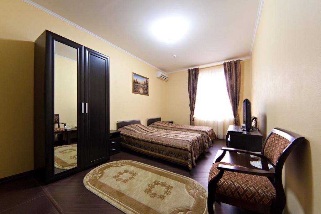 Двухместный (Стандартный двухместный номер с 2 отдельными кроватями) гостиницы Пальмира Клаб, Ставрополь