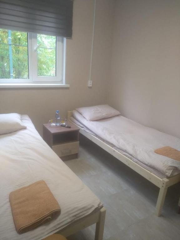 Двухместный (Бюджетный двухместный номер с 2 отдельными кроватями) гостевого дома TosnoSport, Тосно