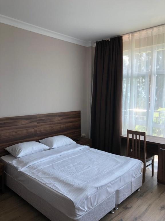 Двухместный (Улучшенный двухместный номер с 1 кроватью или 2 отдельными кроватями) мини-отеля Таис, Сочи