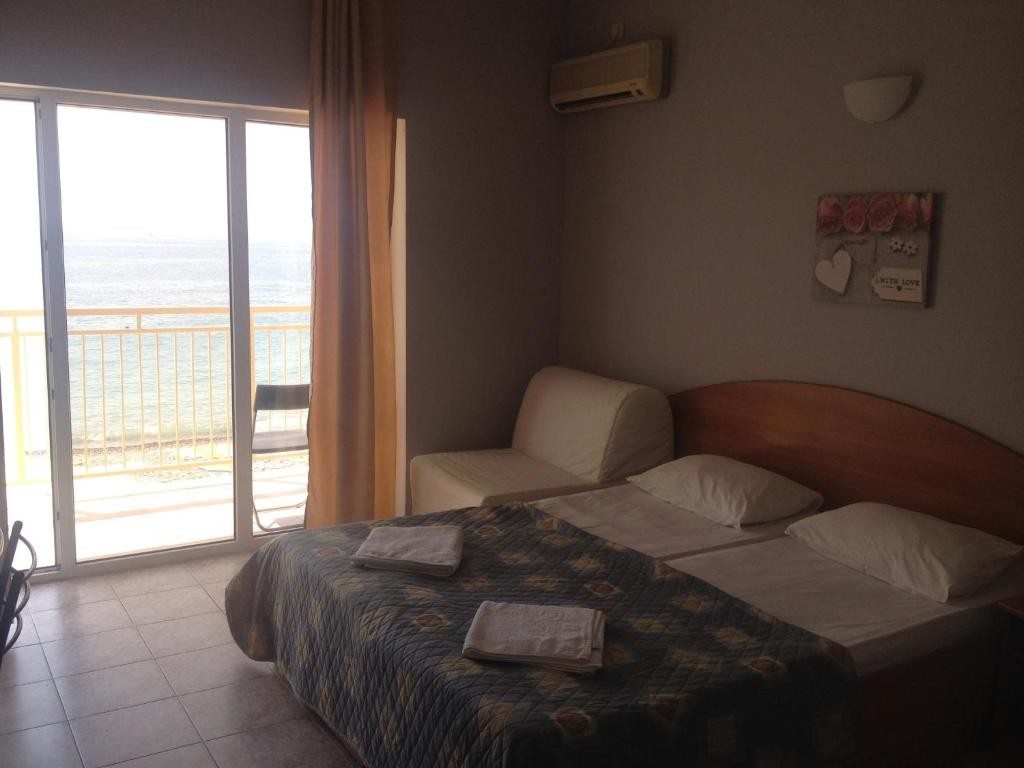 Двухместный (Двухместный номер Делюкс с 1 кроватью или 2 отдельными кроватями и видом на море) гостевого дома Вилла А-Лоо